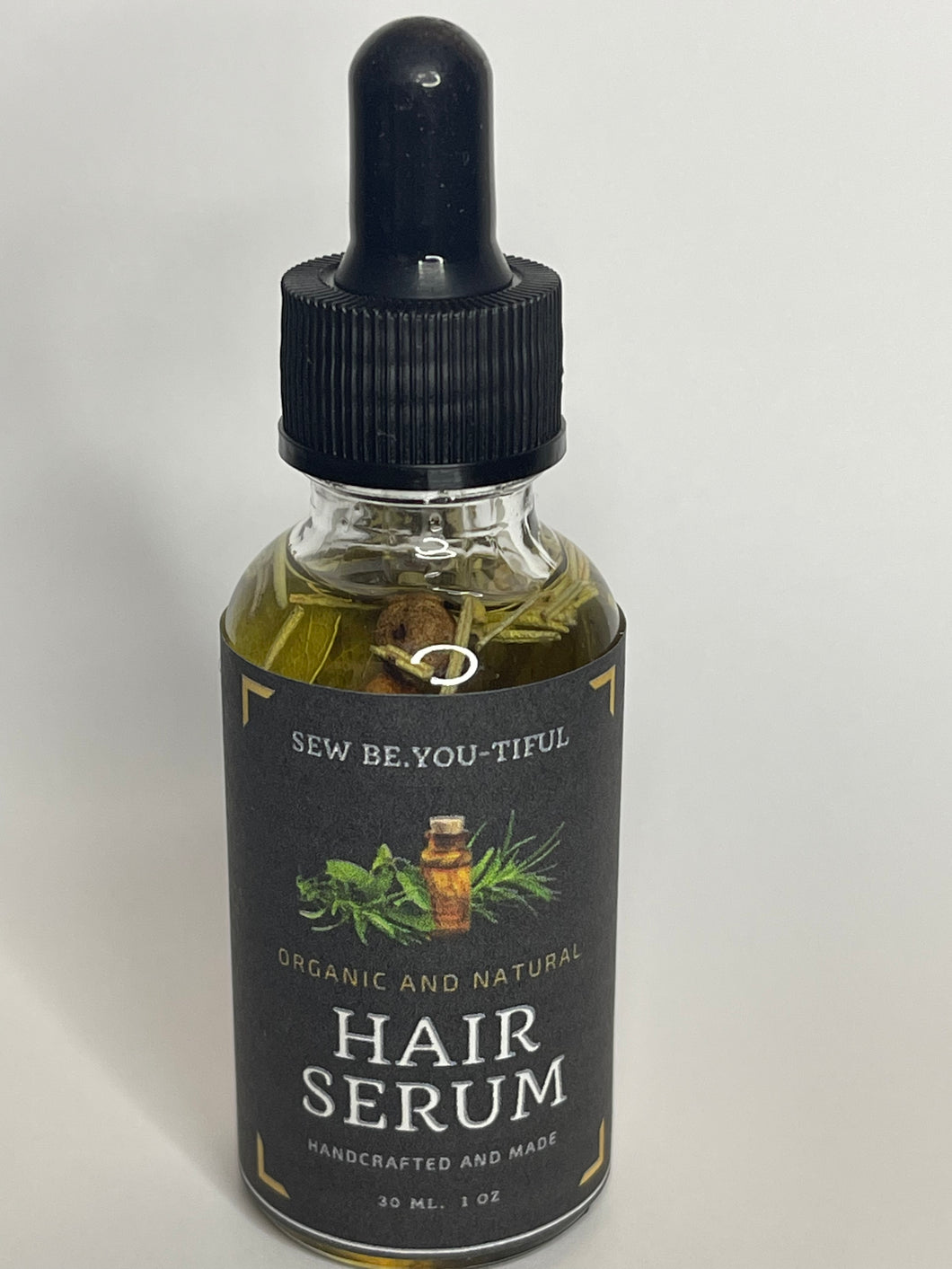 Hair serum which aids in hair growth, moisture and shine
